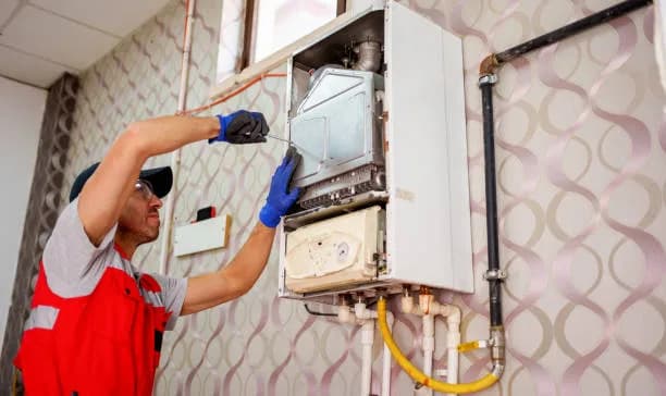 Boiler system and furnace compared in an Ontario home