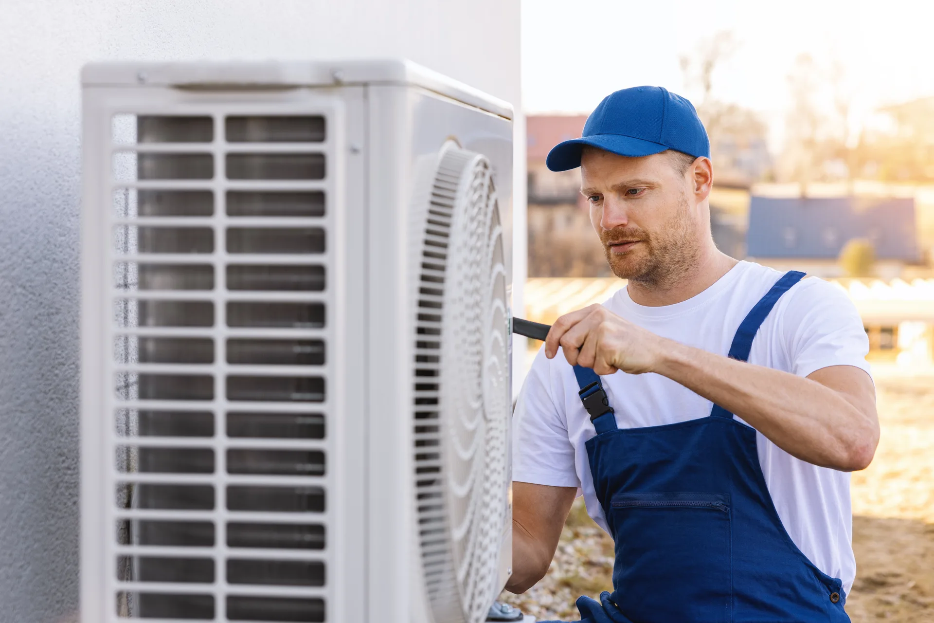Licensed ZK Mechanical technician servicing a residential heat pump at a GTA home